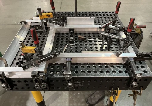 aluminum weldment on welding table fixture large welding & metal fabrication services