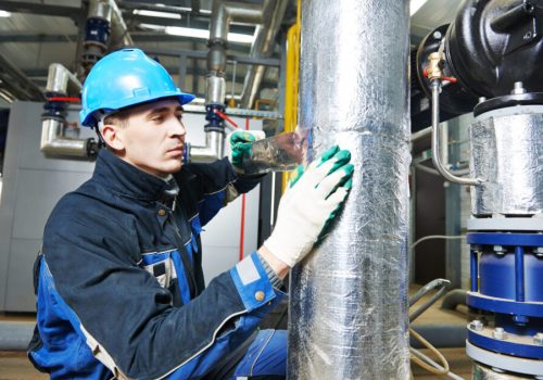 industrial worker at insulation work